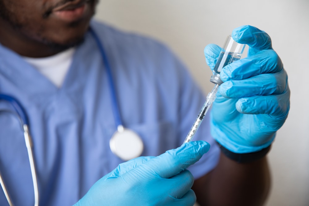 a doctor examining a patient's teeth