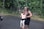 a woman and a child on a swing
