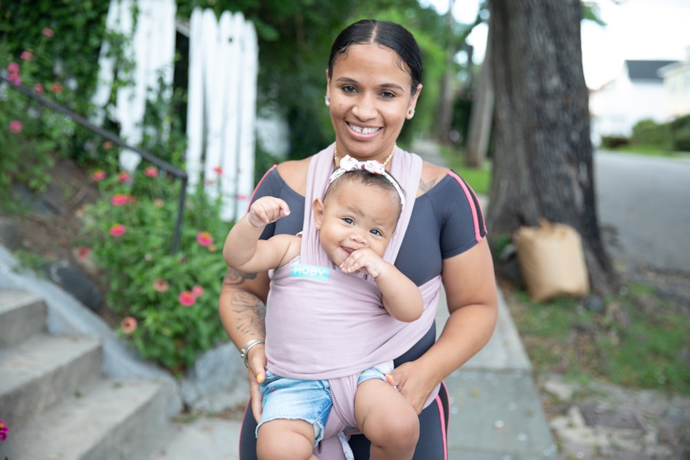 a person holding a baby