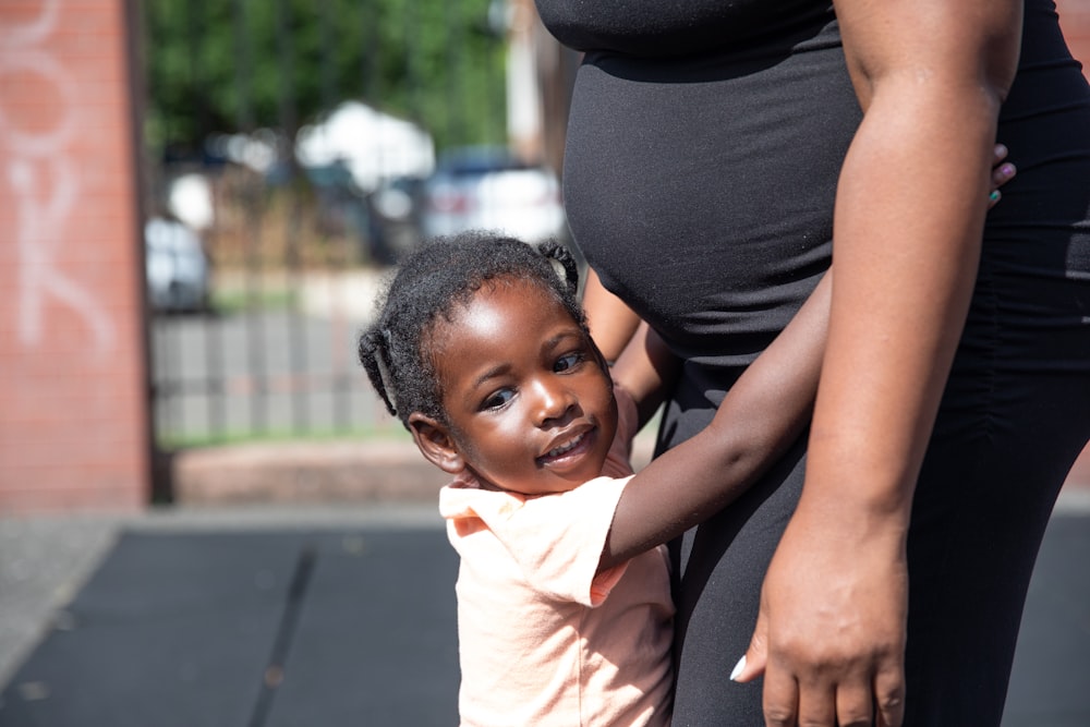 a person carrying a child