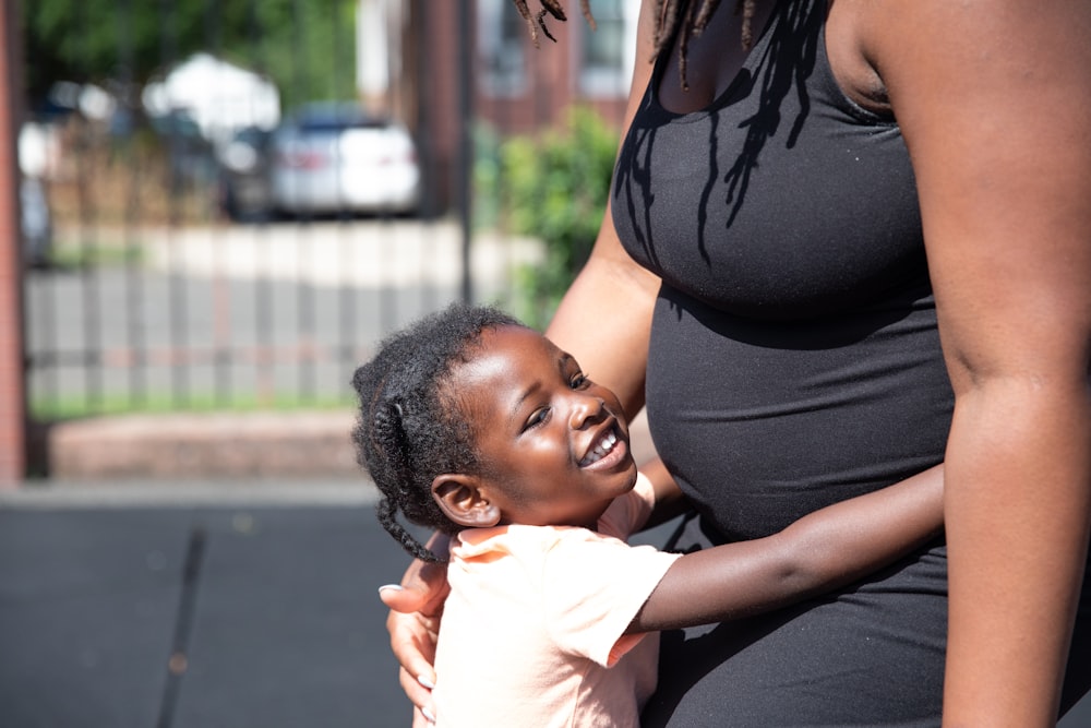 a person holding a baby