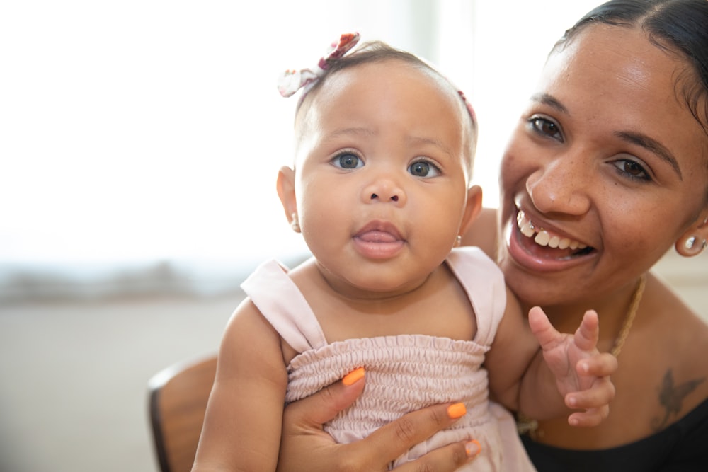 a person holding a baby