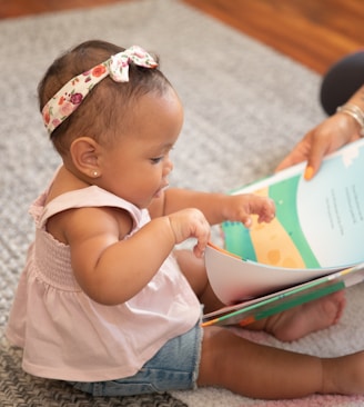 a baby reading a book