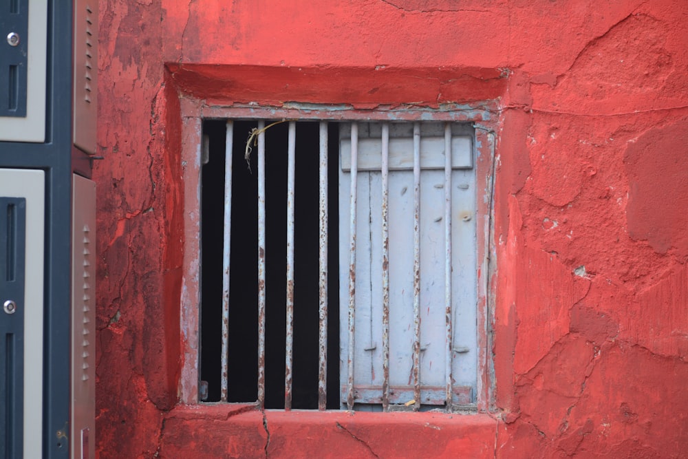 a window in a red building