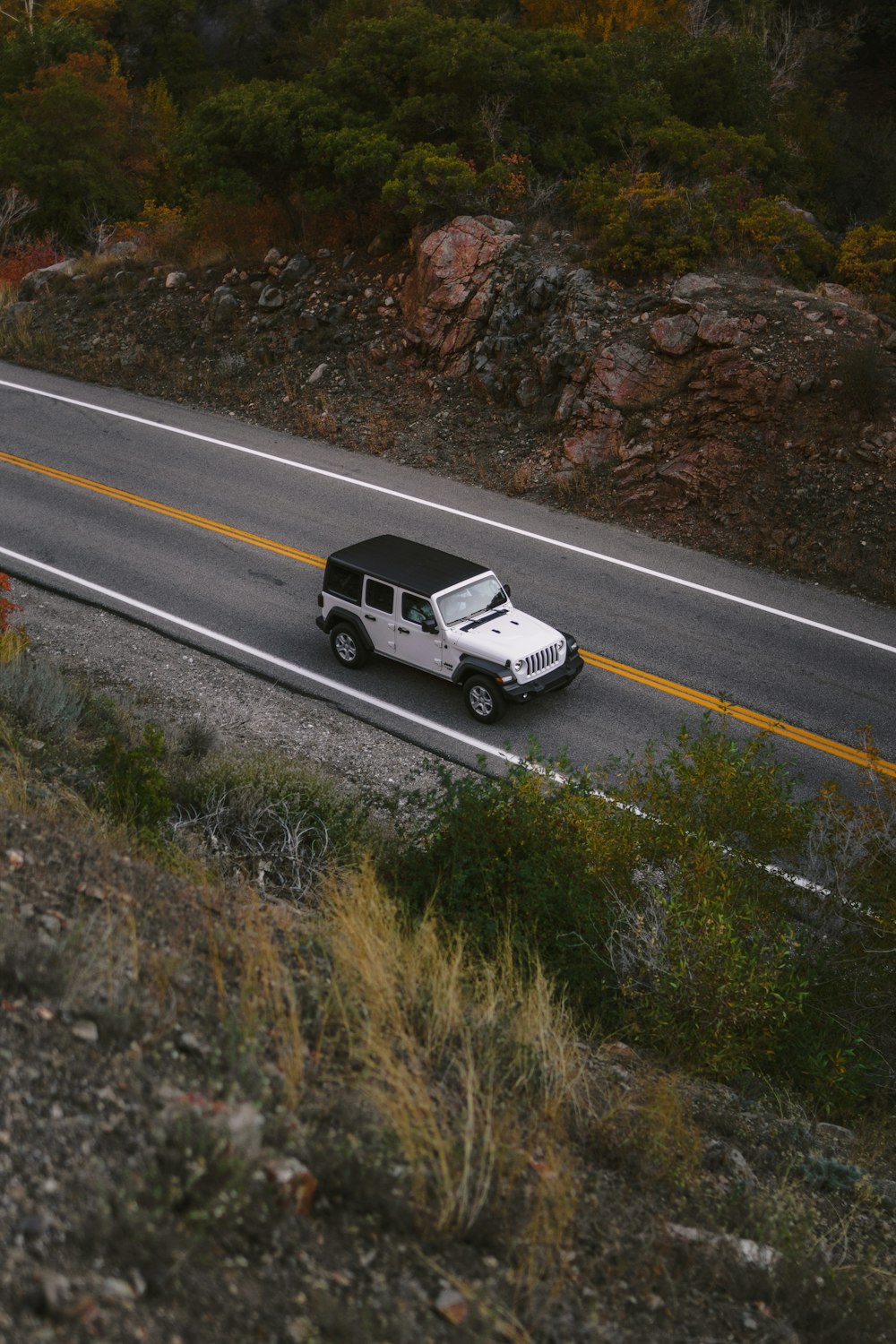 a white truck on a road