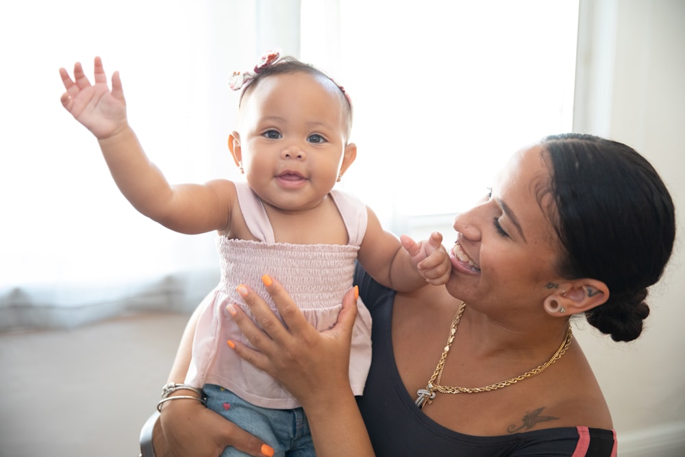 a person holding a baby