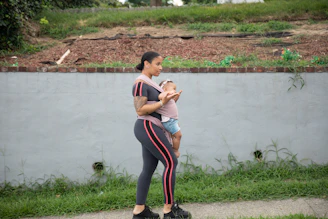 a person holding a baby