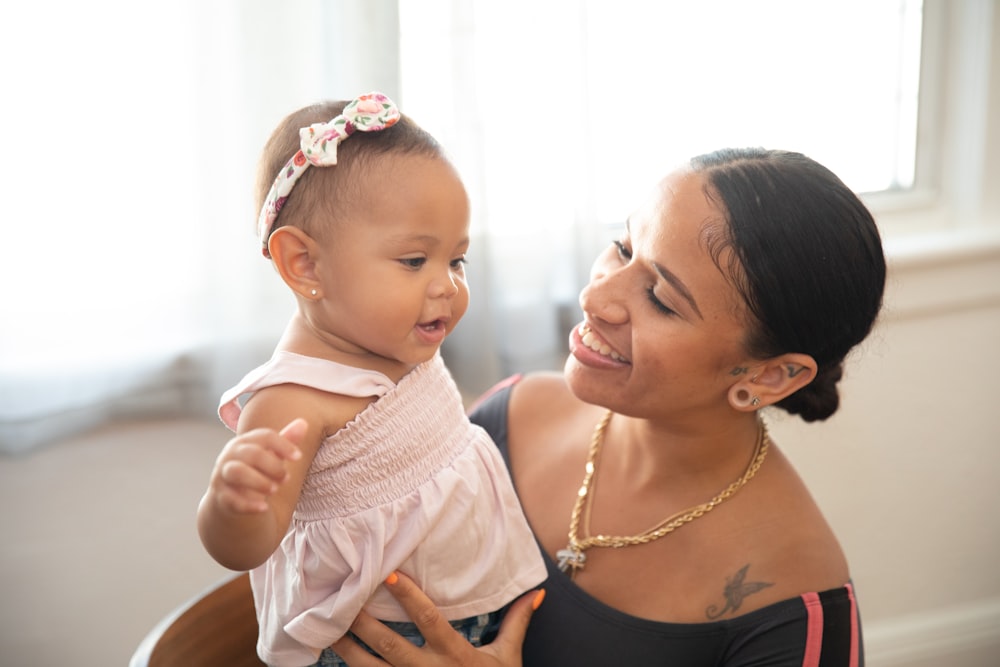 a person holding a baby