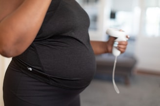 a person holding a video game controller