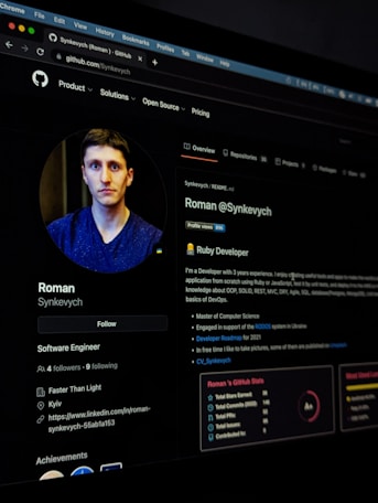 A digital profile screen viewed on a web browser, showcasing a user's account on a platform. The profile includes a photo of a person, details about their job as a Software Engineer, and professional achievements. There is also a description of their developer skills and project experiences. The GitHub interface shows navigation tabs along the top and profile details in the main content area.