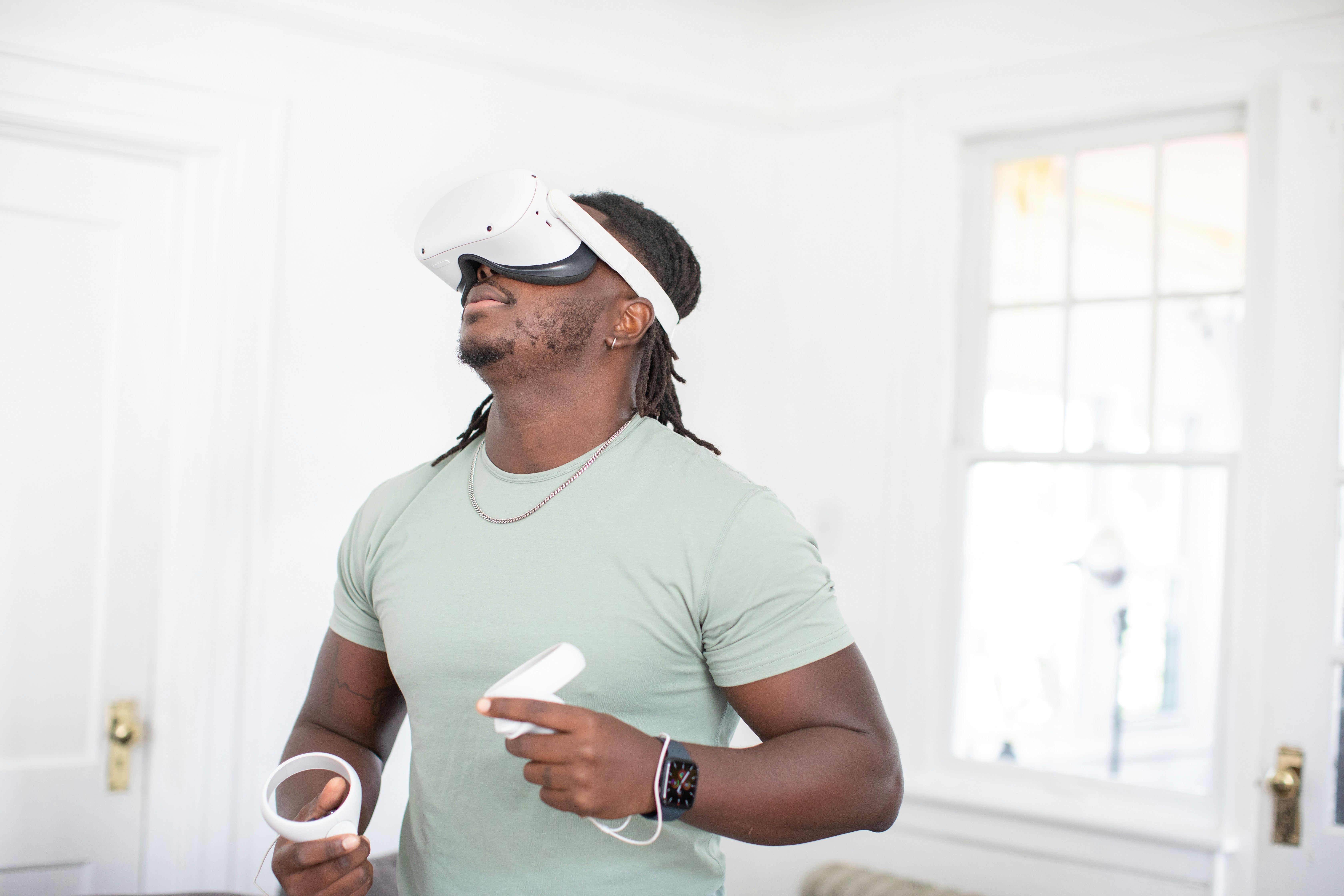 compression therapy wearable medical device - a man wearing a hat and holding a game controller