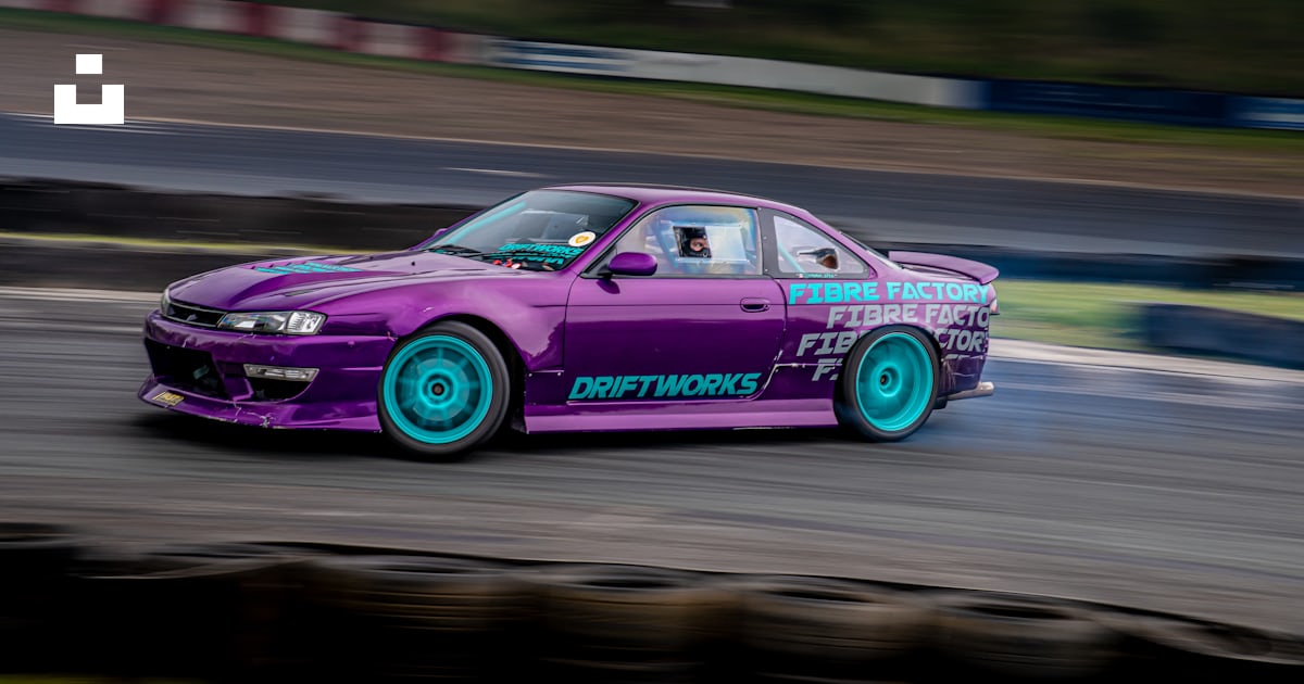 A purple race car on a track photo – Free Middlesbrough Image on Unsplash