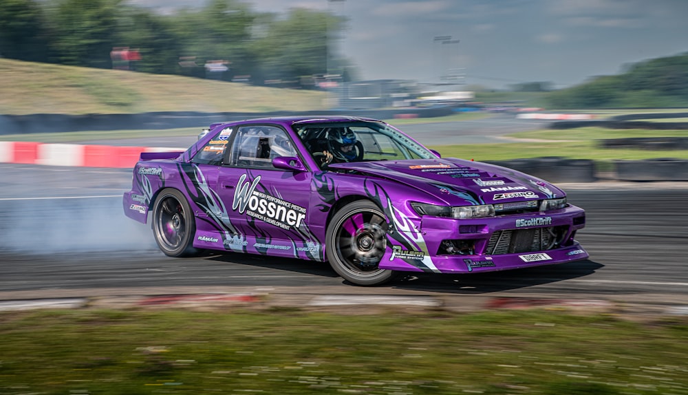 a purple race car on a track