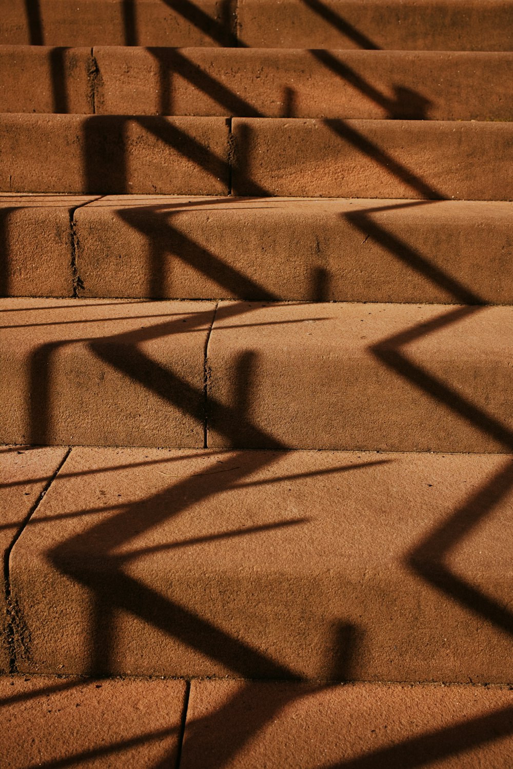 shadows of people on a wooden surface