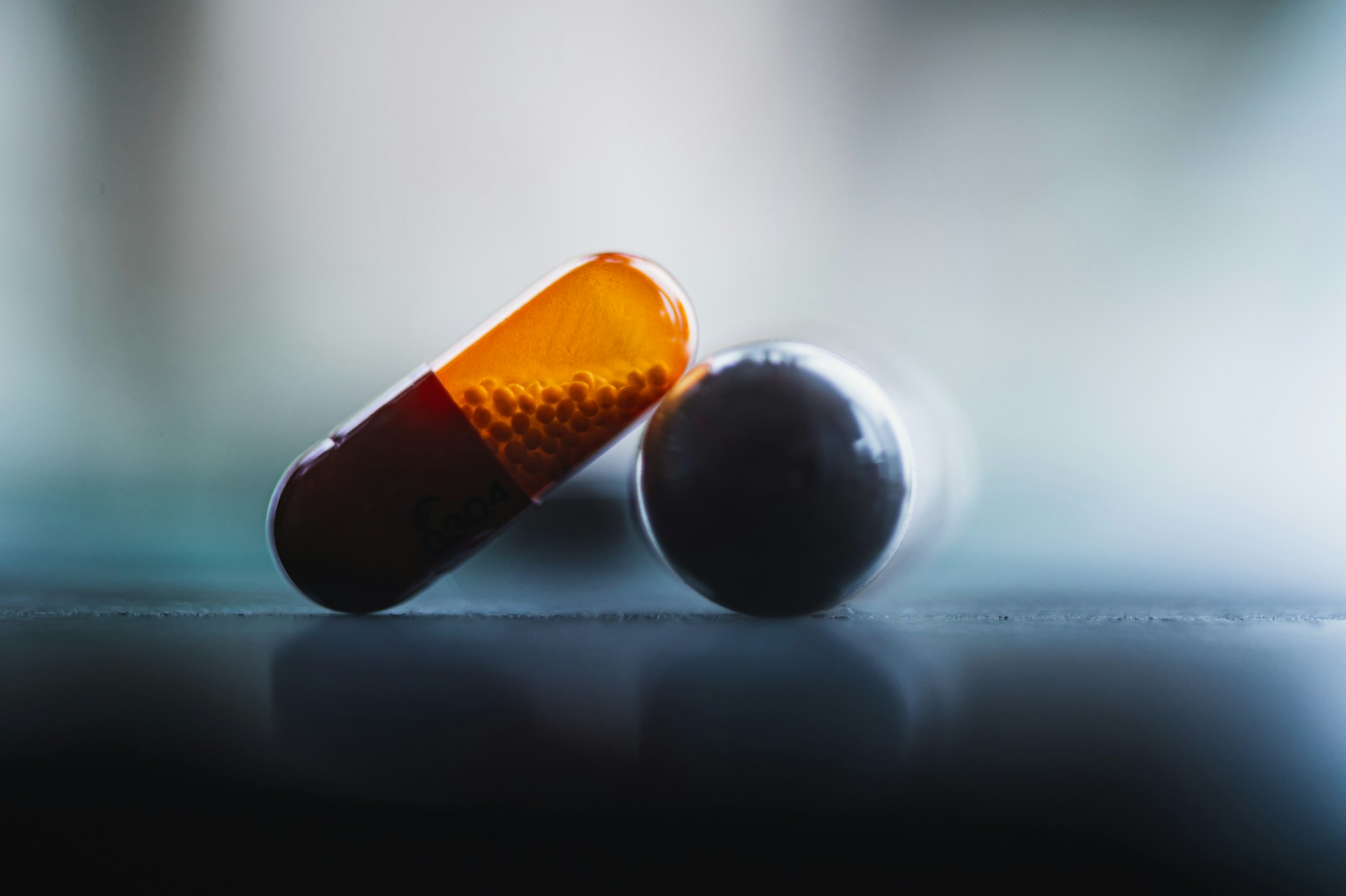 a red and white capsule