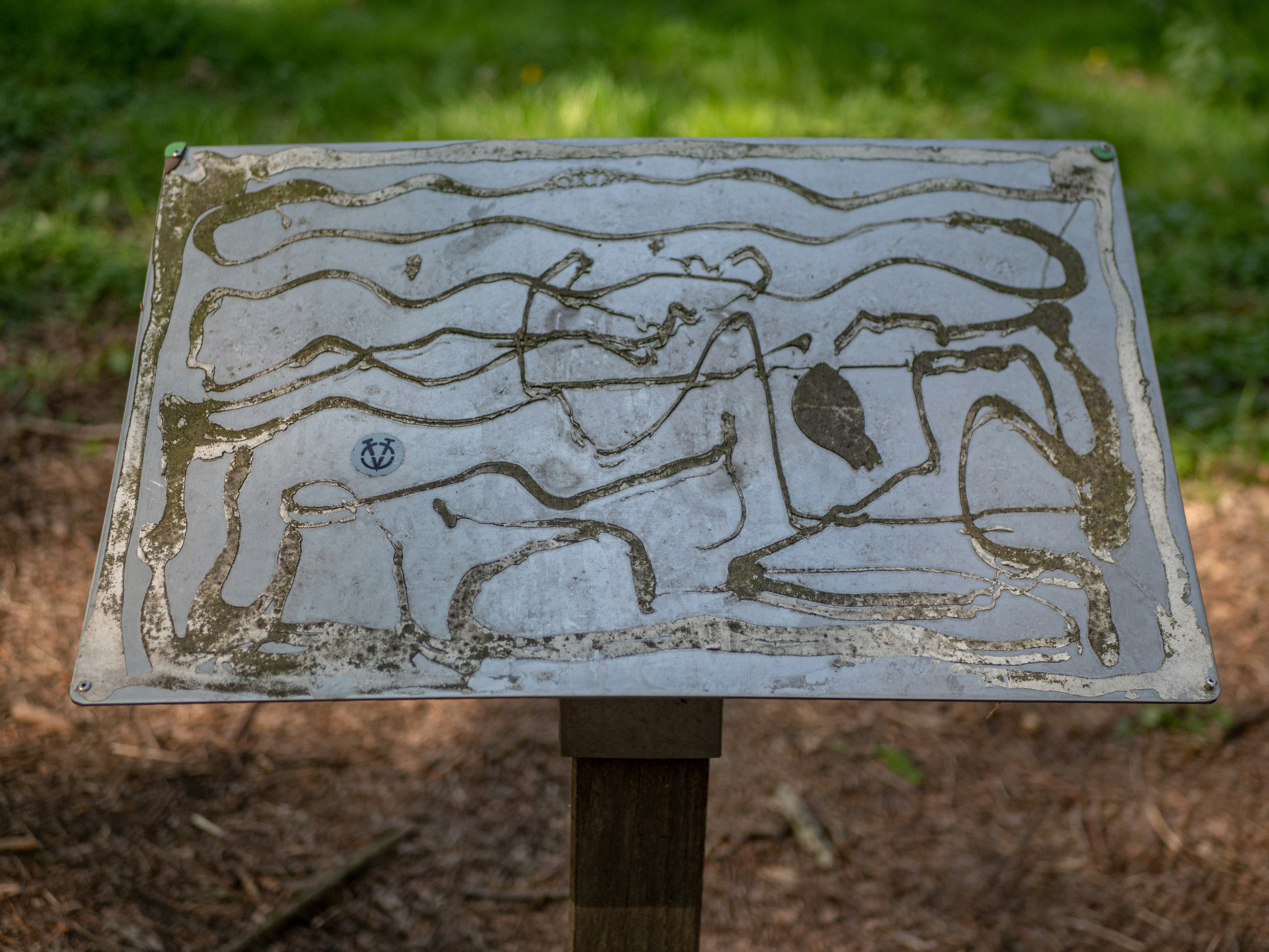 a white rectangular object with a design on it