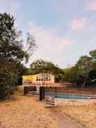 A peaceful home exterior bathed in warm afternoon light symbolizing security.