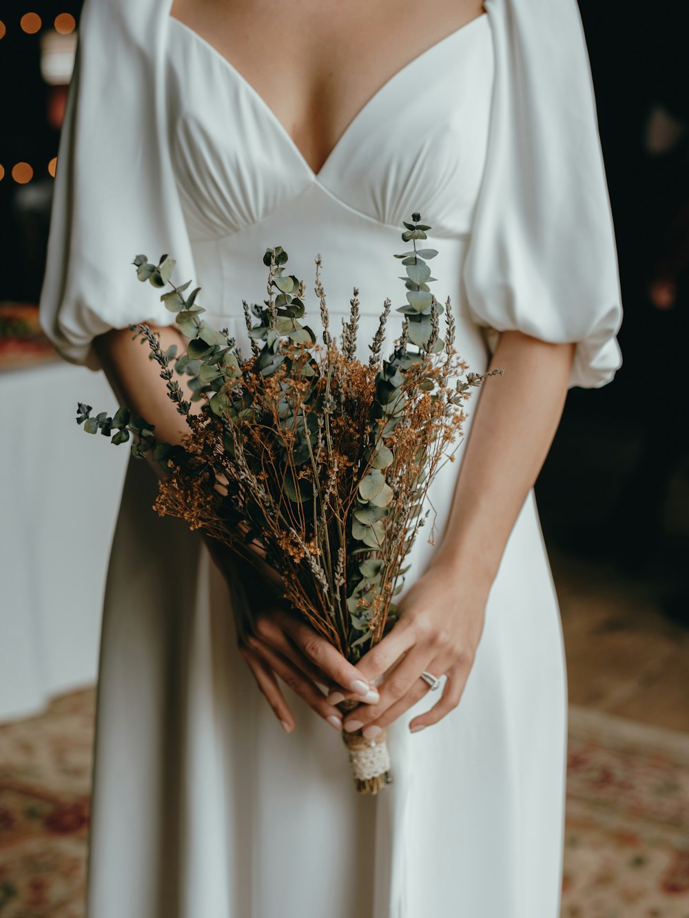 a woman wearing a white dress