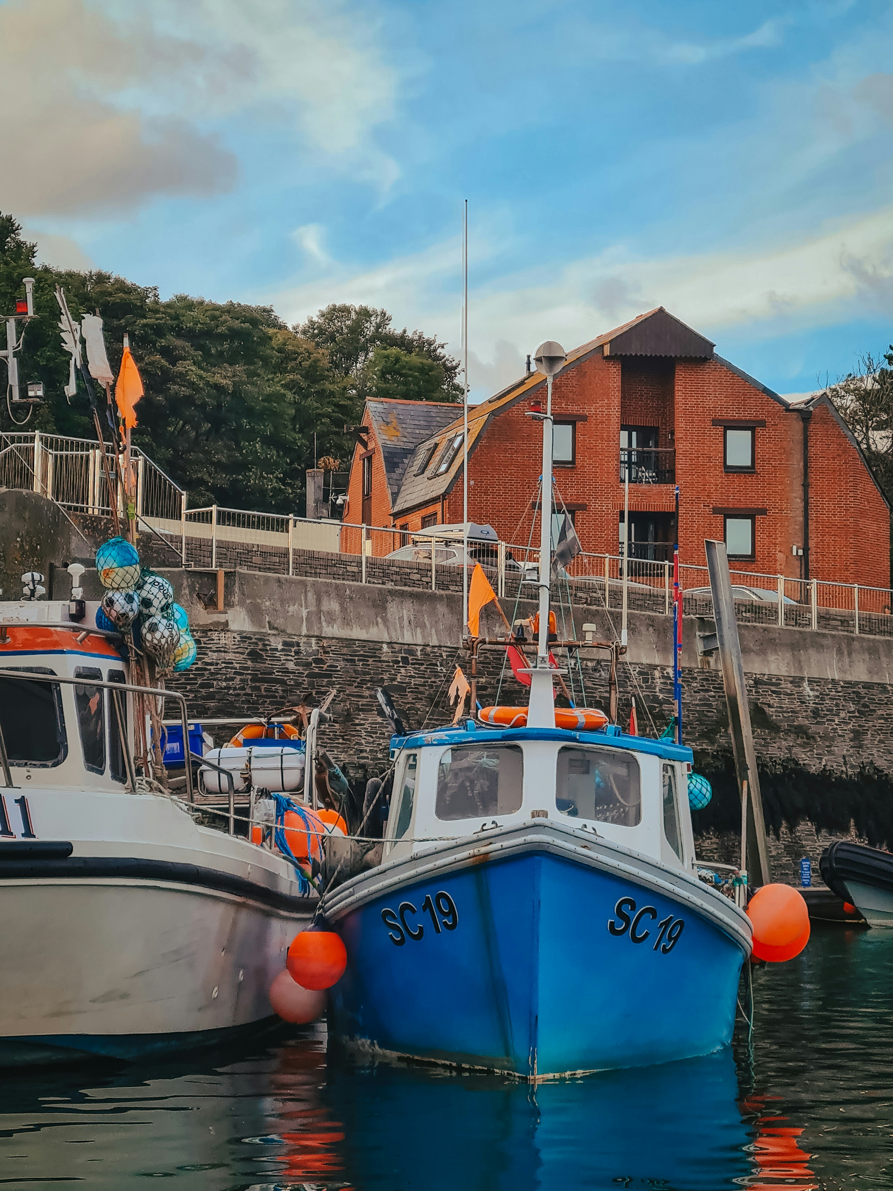 boats docked at a pier