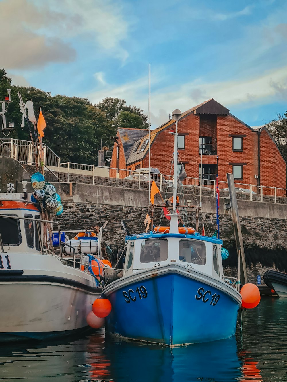 boats docked at a pier