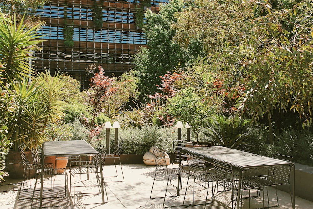 a patio with a table and chairs