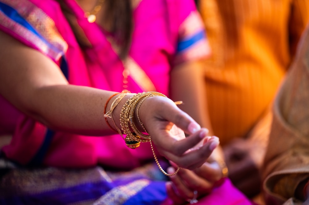 a group of people holding hands