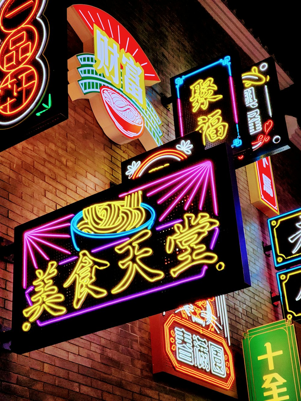 a sign with neon signs