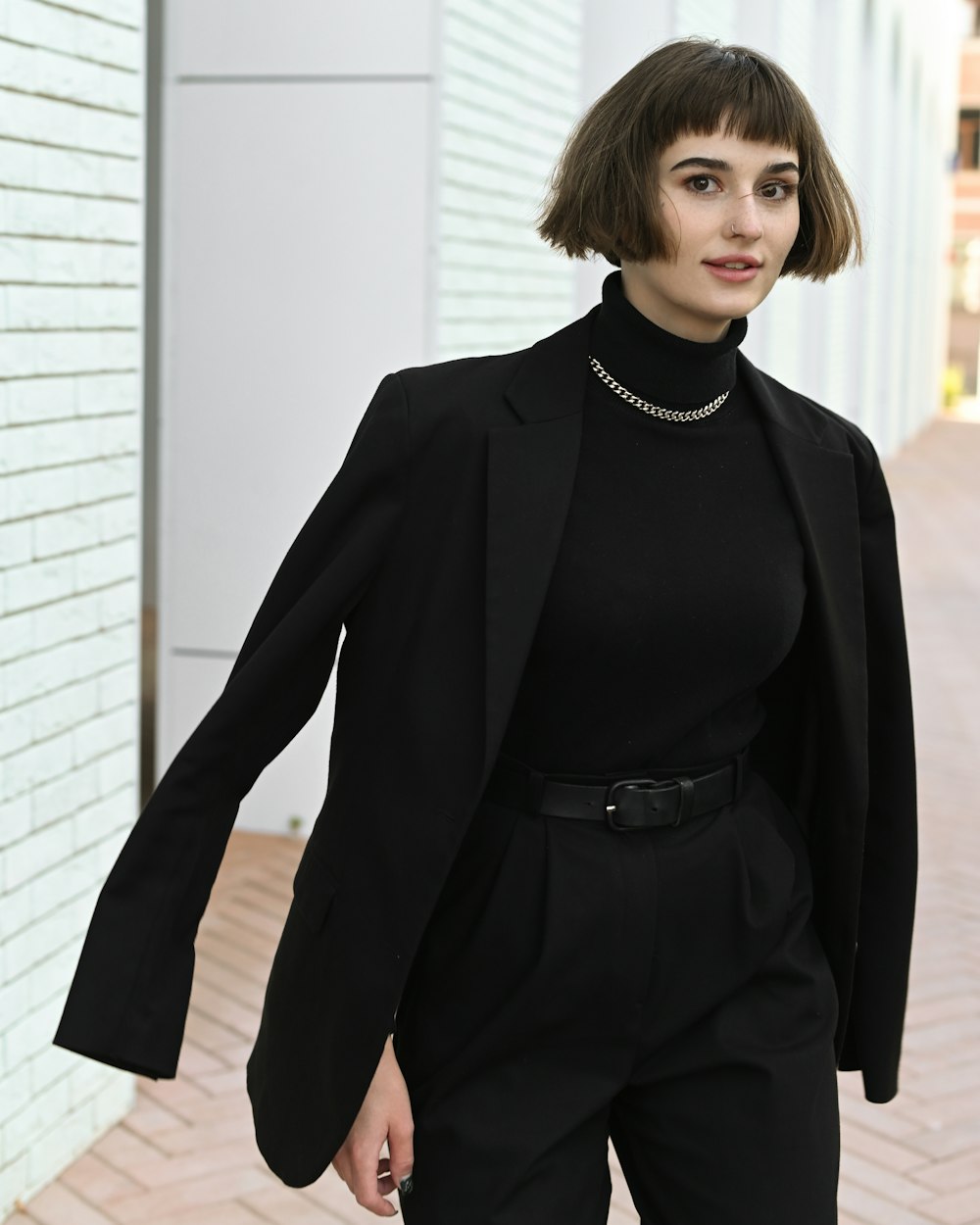 a person in black suit