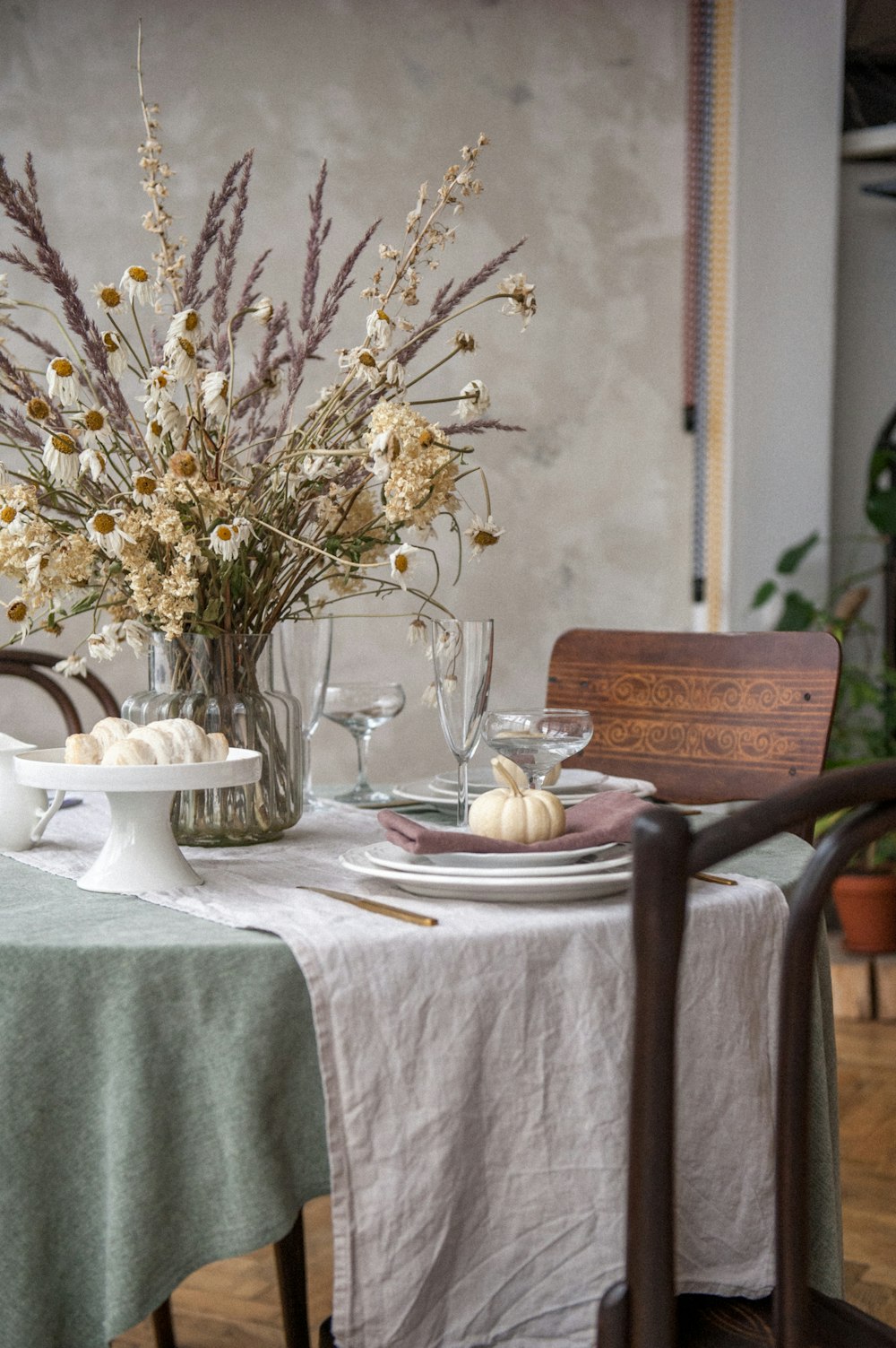 a table with plates and glasses on it