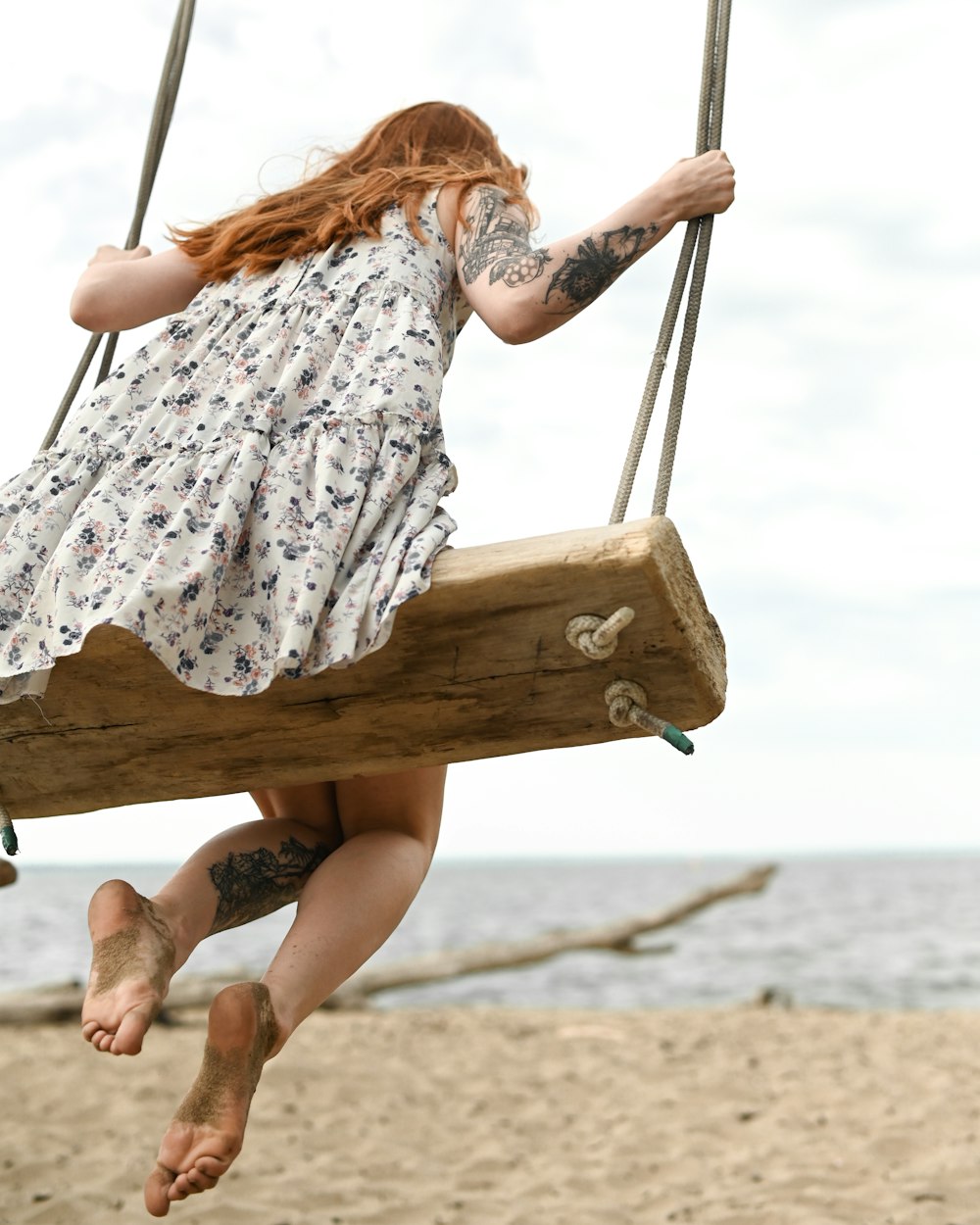 a person holding a wooden pole