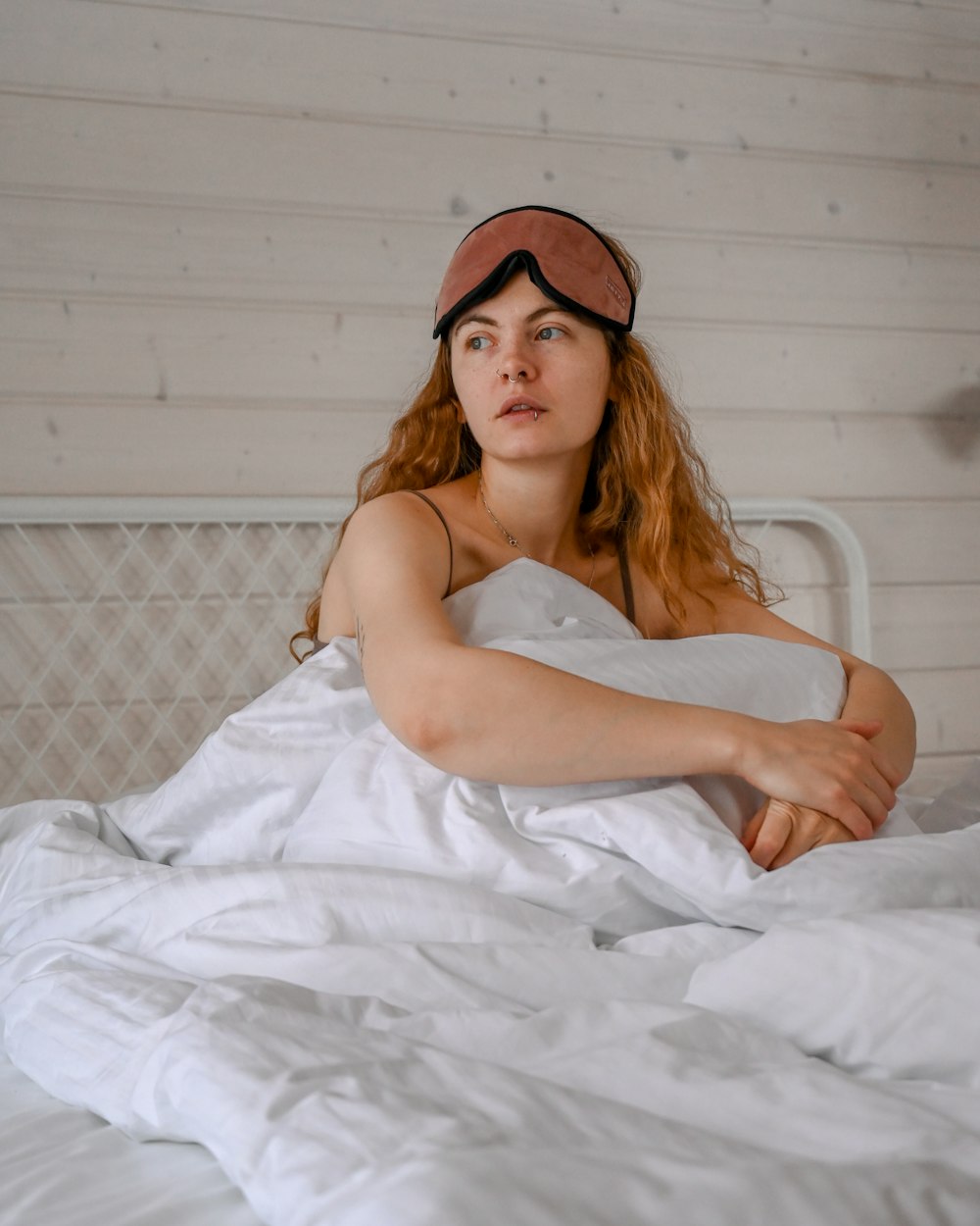 a woman lying on a bed