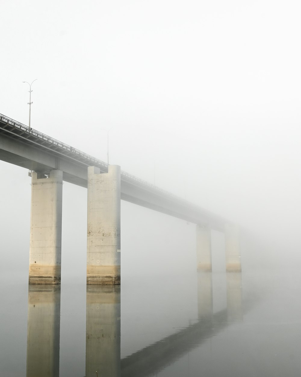 a bridge with fog