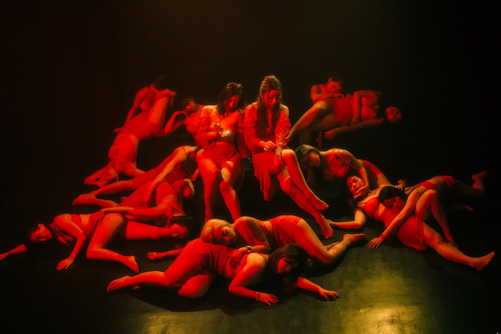 a group of people in red clothing