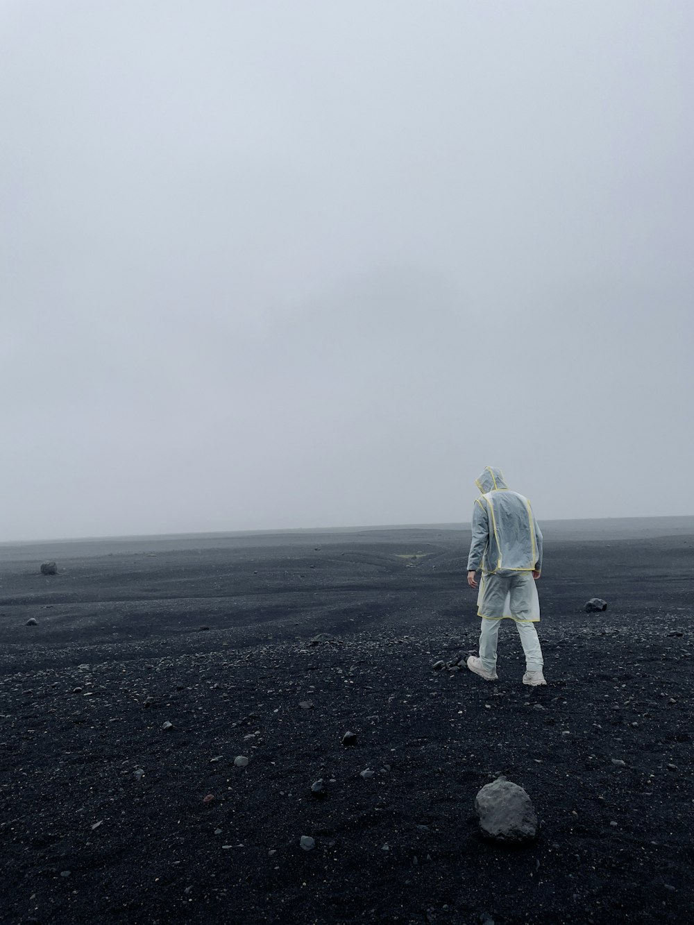 a man walking on a beach