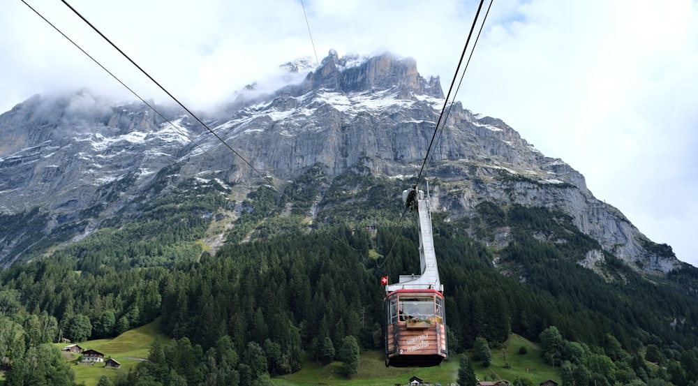 a cable car going up a mountain