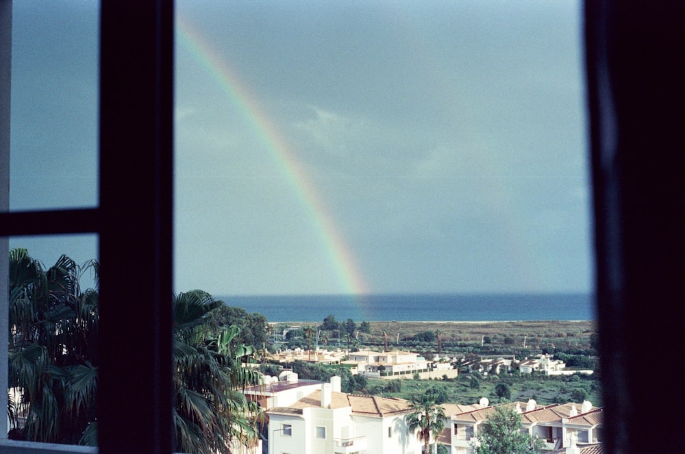 a rainbow over a city