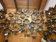 A collection of unique wall clocks showcasing craftsmanship.
