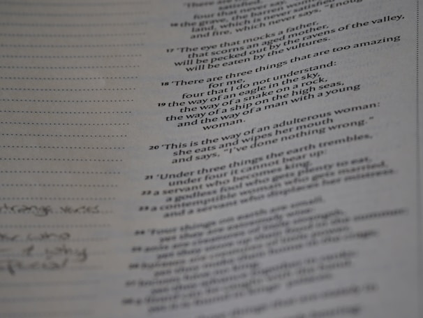 A page from a book or document featuring various numbered textual entries. The text is black and printed on an off-white or greyish paper. Some handwritten notes appear in the left margin, with dotted lines for additional writing.