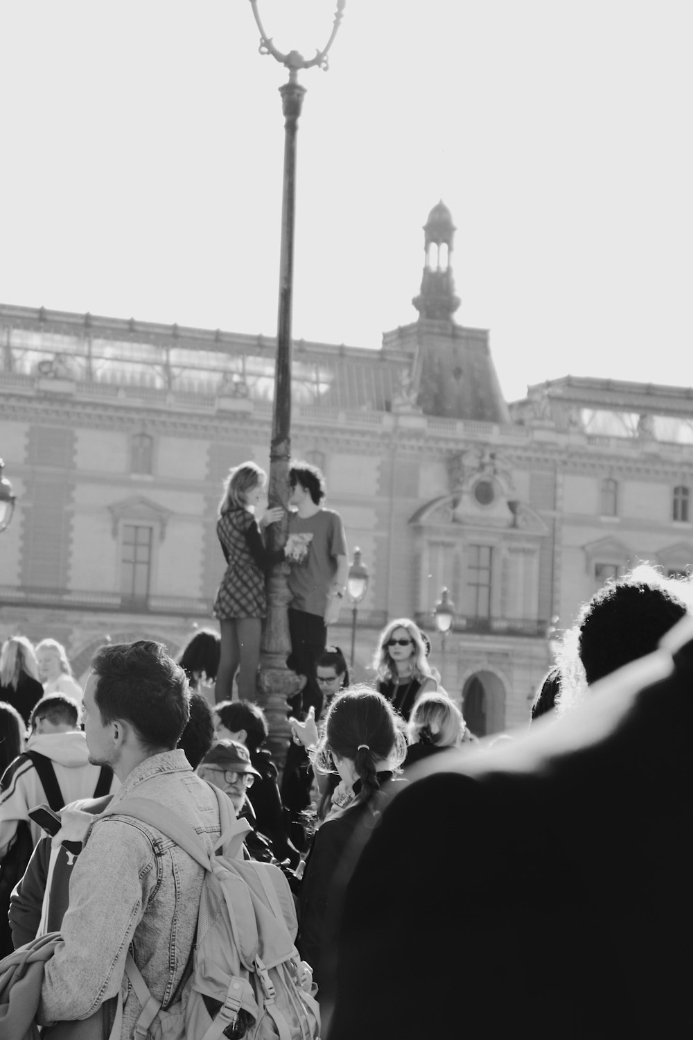 a group of people standing outside a building