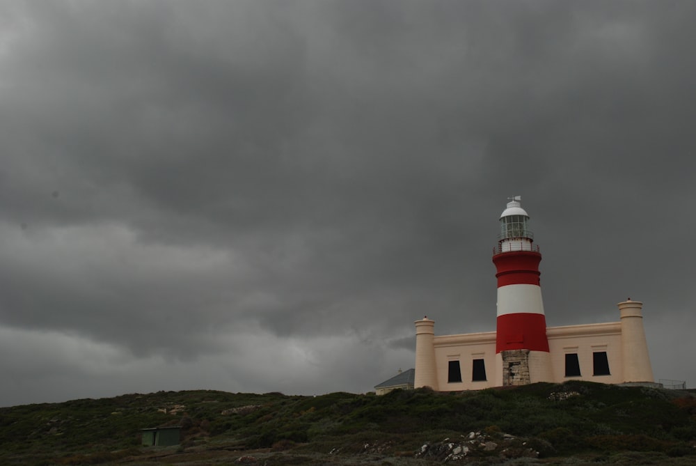 a lighthouse on a hill