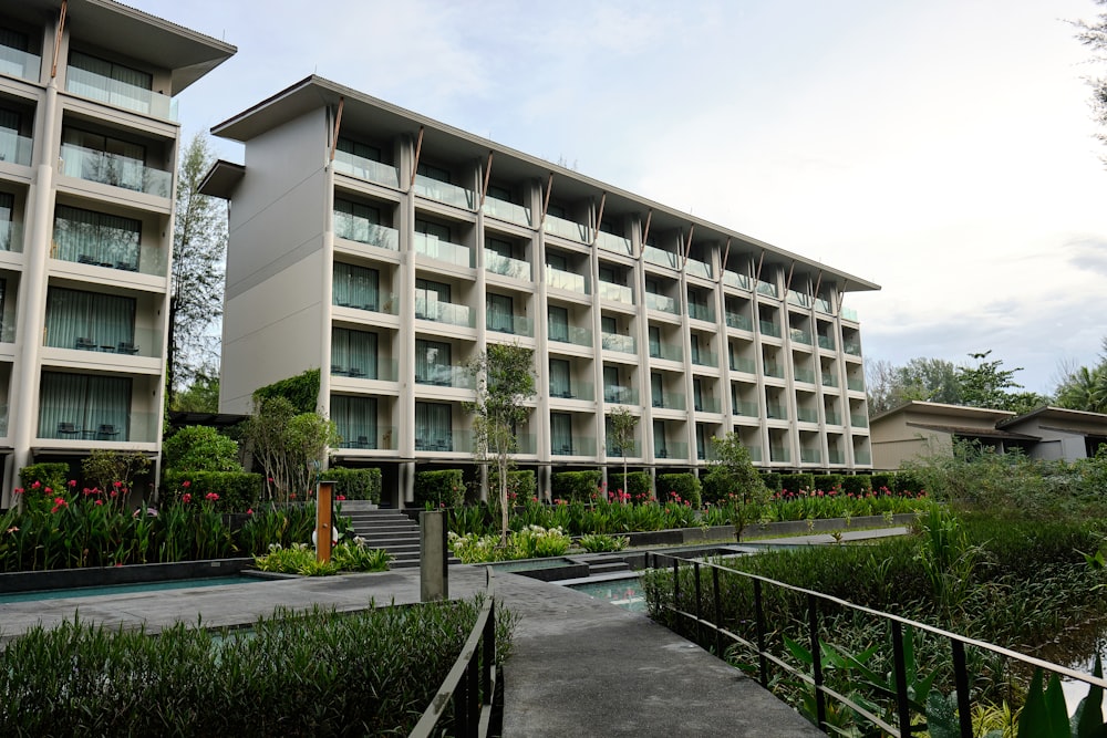 a building with a garden in front