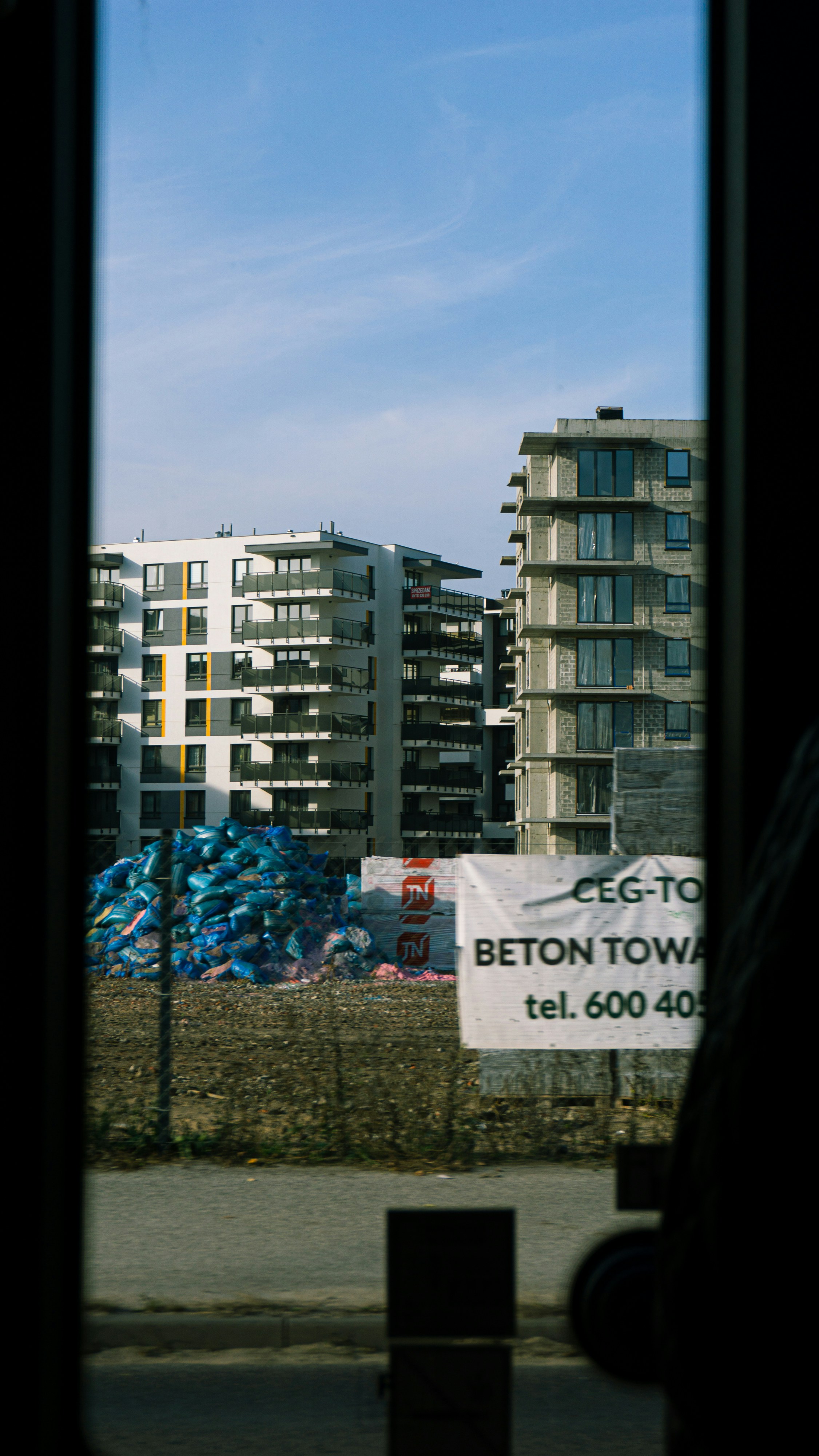 a sign in front of a building