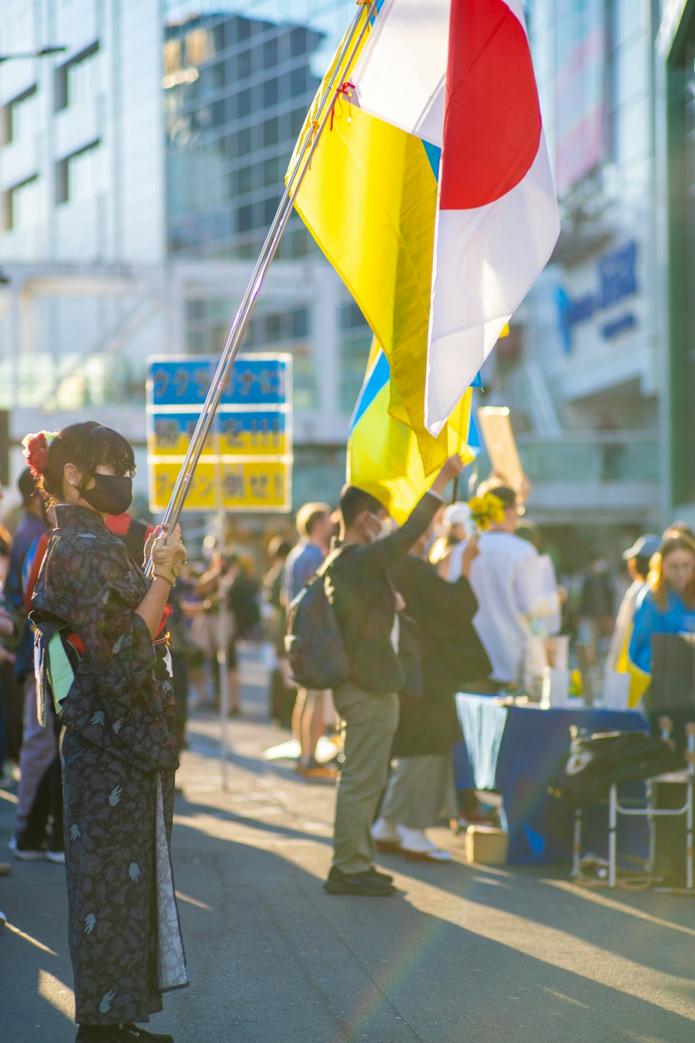 a group of people holding flags