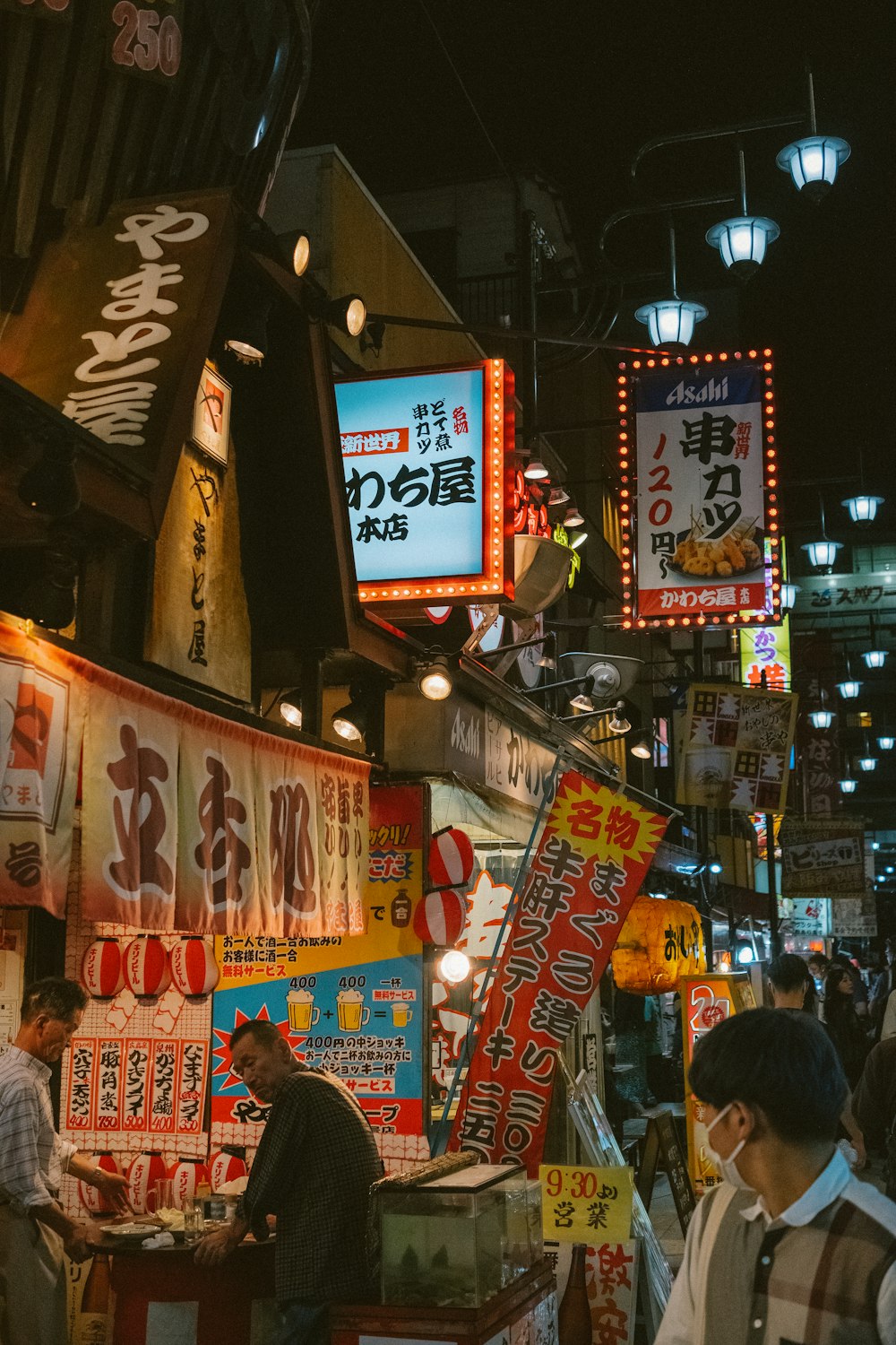 a busy street with many signs