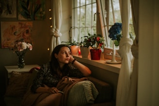 a person sitting on a couch