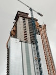a crane lifting a building