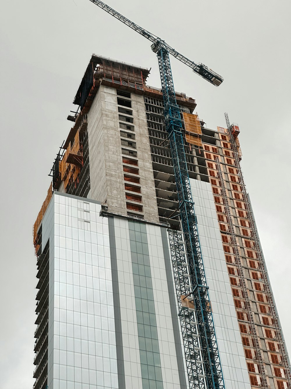 a crane lifting a building