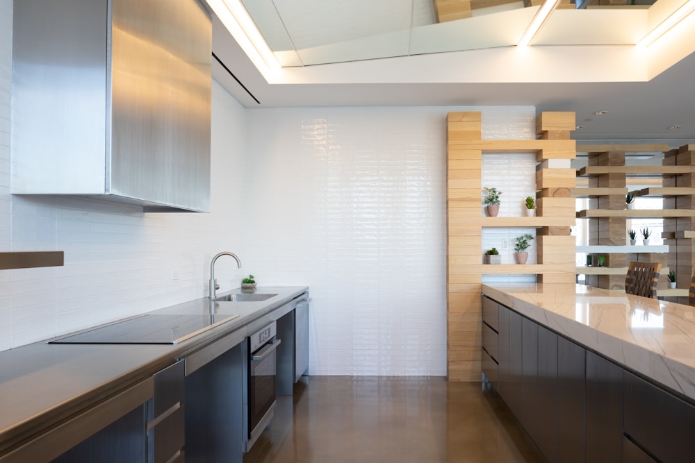 a kitchen with white cabinets