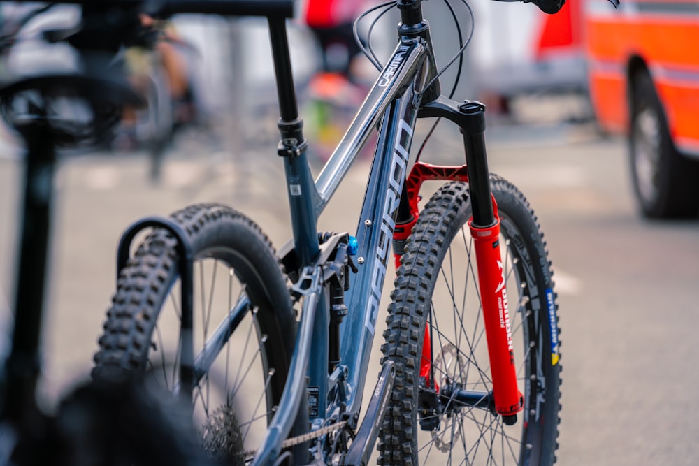 a bicycle is parked on the side of the road