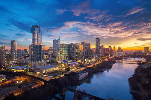 The Austin skyline and river at sunset